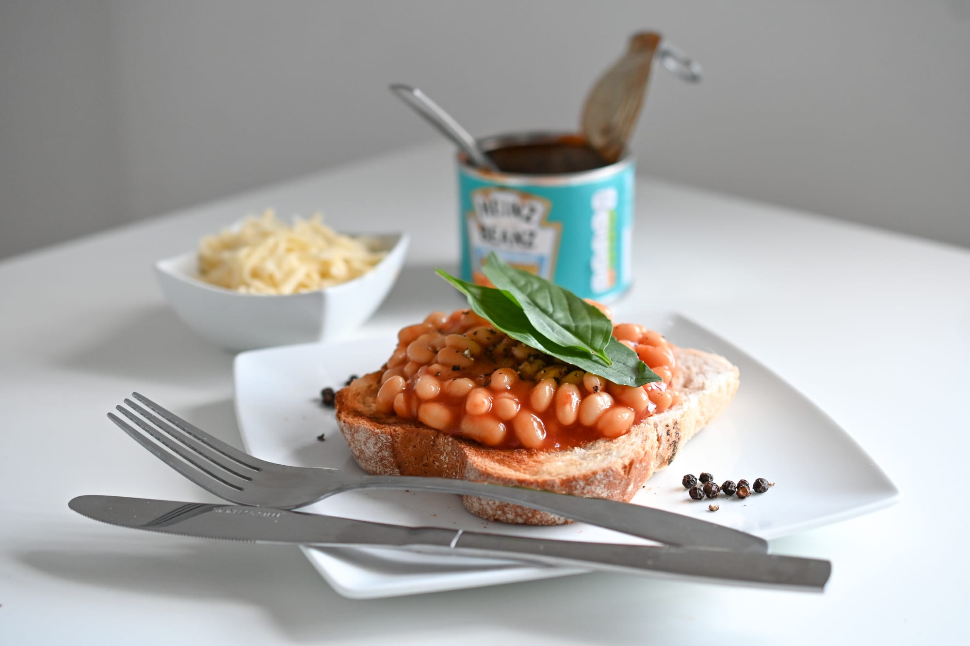 Beans on toast with some basil