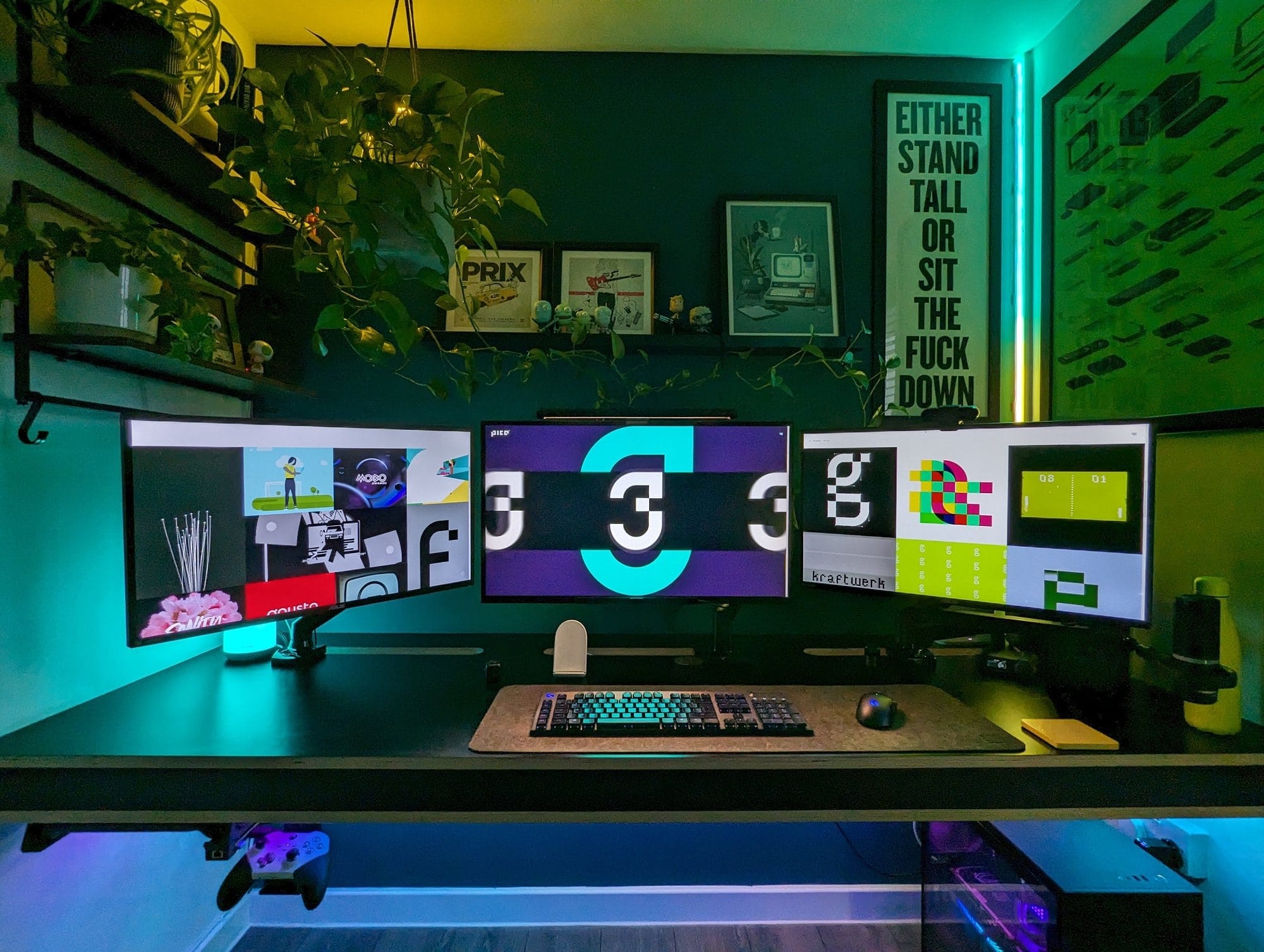 A contemporary home office setup with a sleek desk featuring a triple-monitor display, surrounded by vibrant plants, framed art, motivational posters, and ambient LED lighting