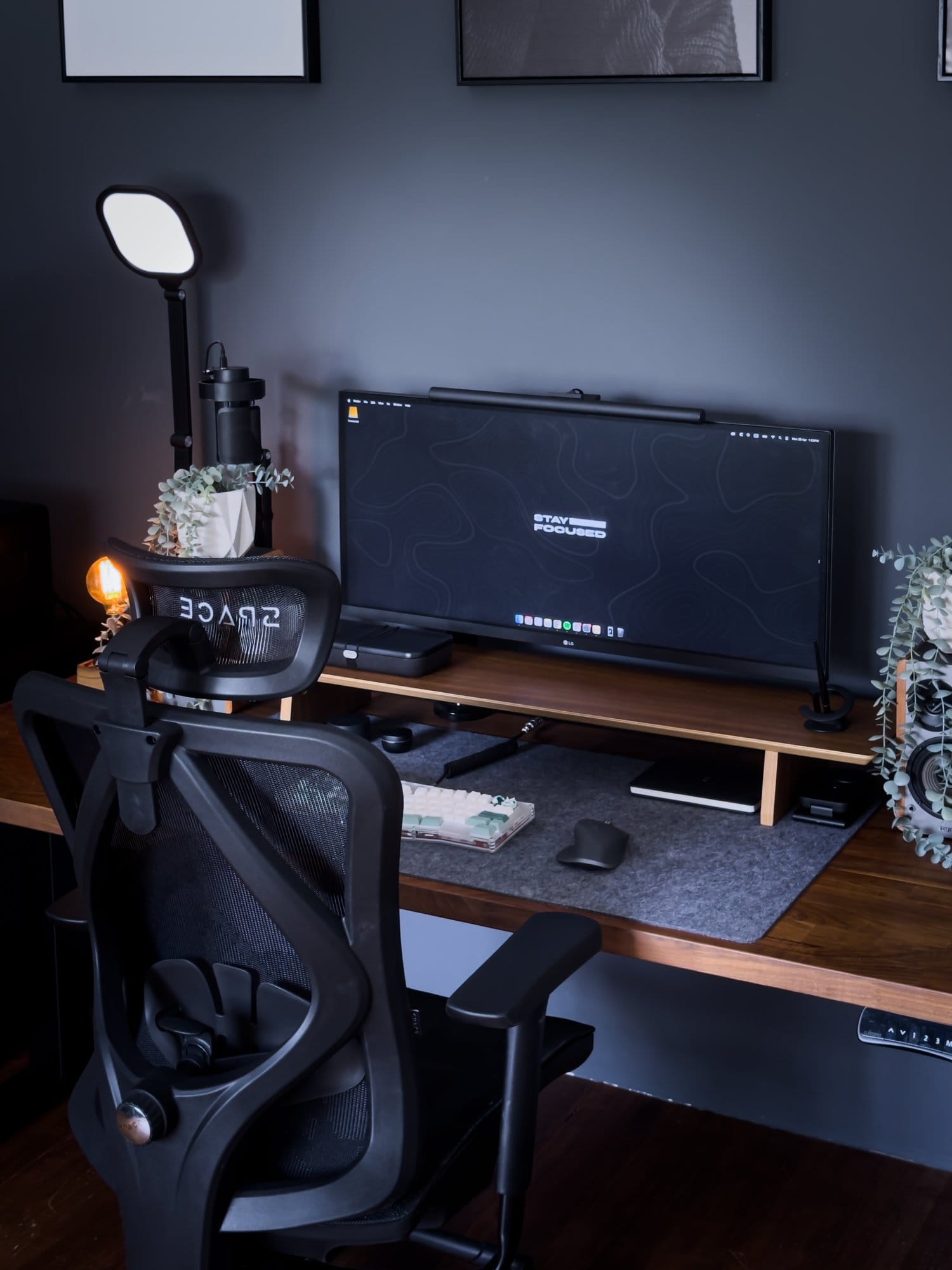 A minimalist workspace featuring an LG 34WK650 monitor, Switch Couture Frosted Acrylic Alice keyboard, and a SPACE Ergonomic Seat Pro chair
