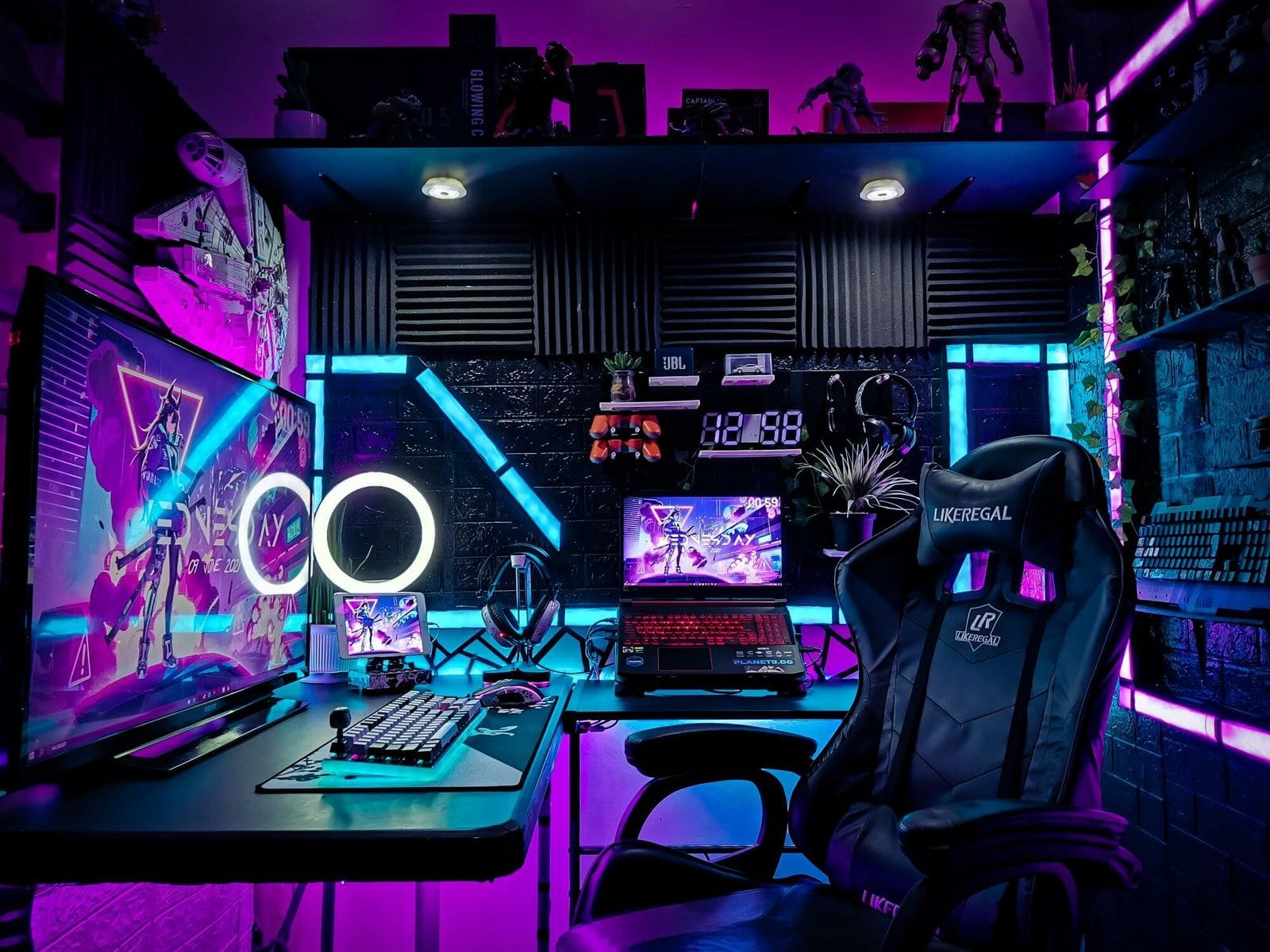 A gaming setup with neon lights and RGB