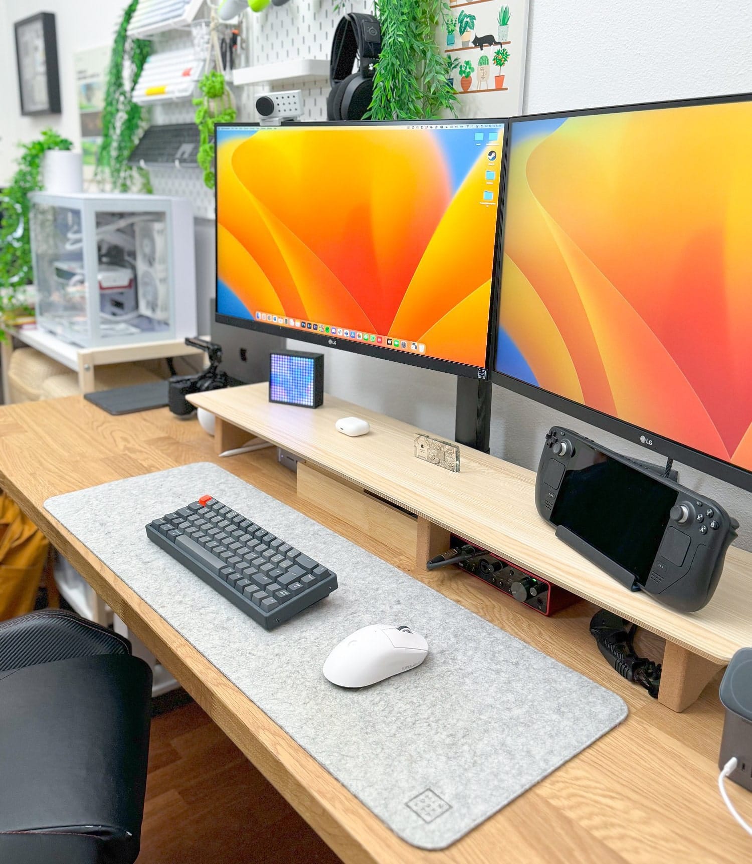 A bright dual-monitor desk setup