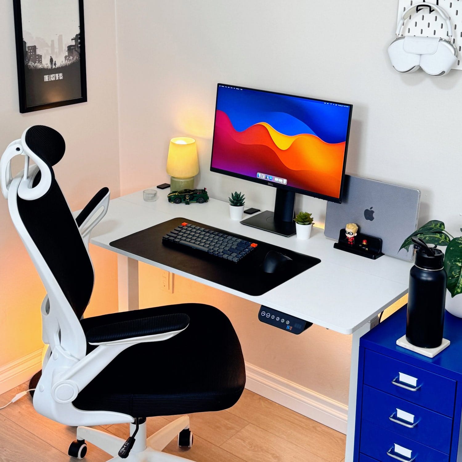 A home workspace with a SHW adjustable desk