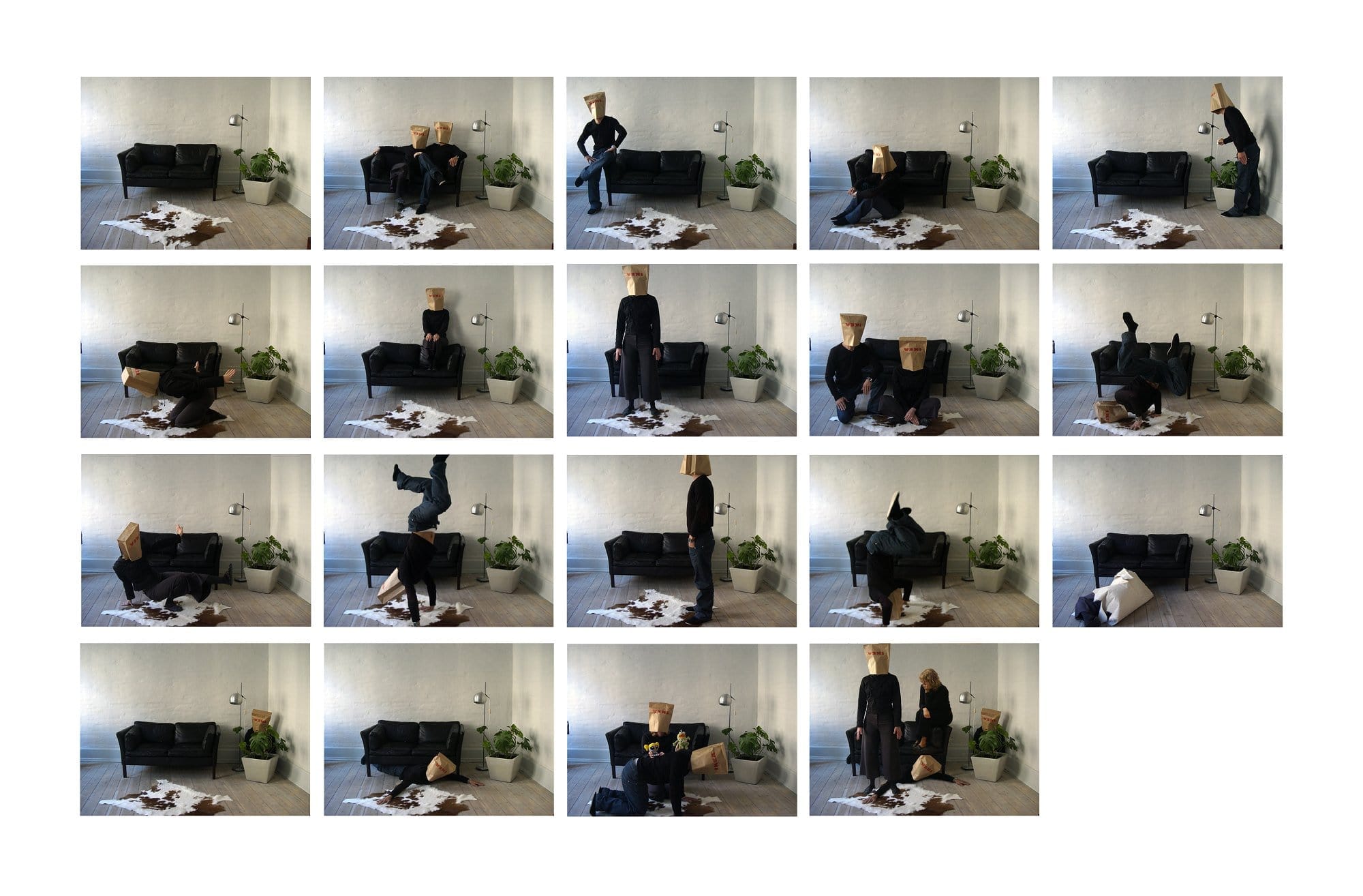 A sequence of images with a person wearing a paper bag over their head performing various playful, physical actions in a minimalist room with a black sofa, a cowhide rug, and a large potted plant