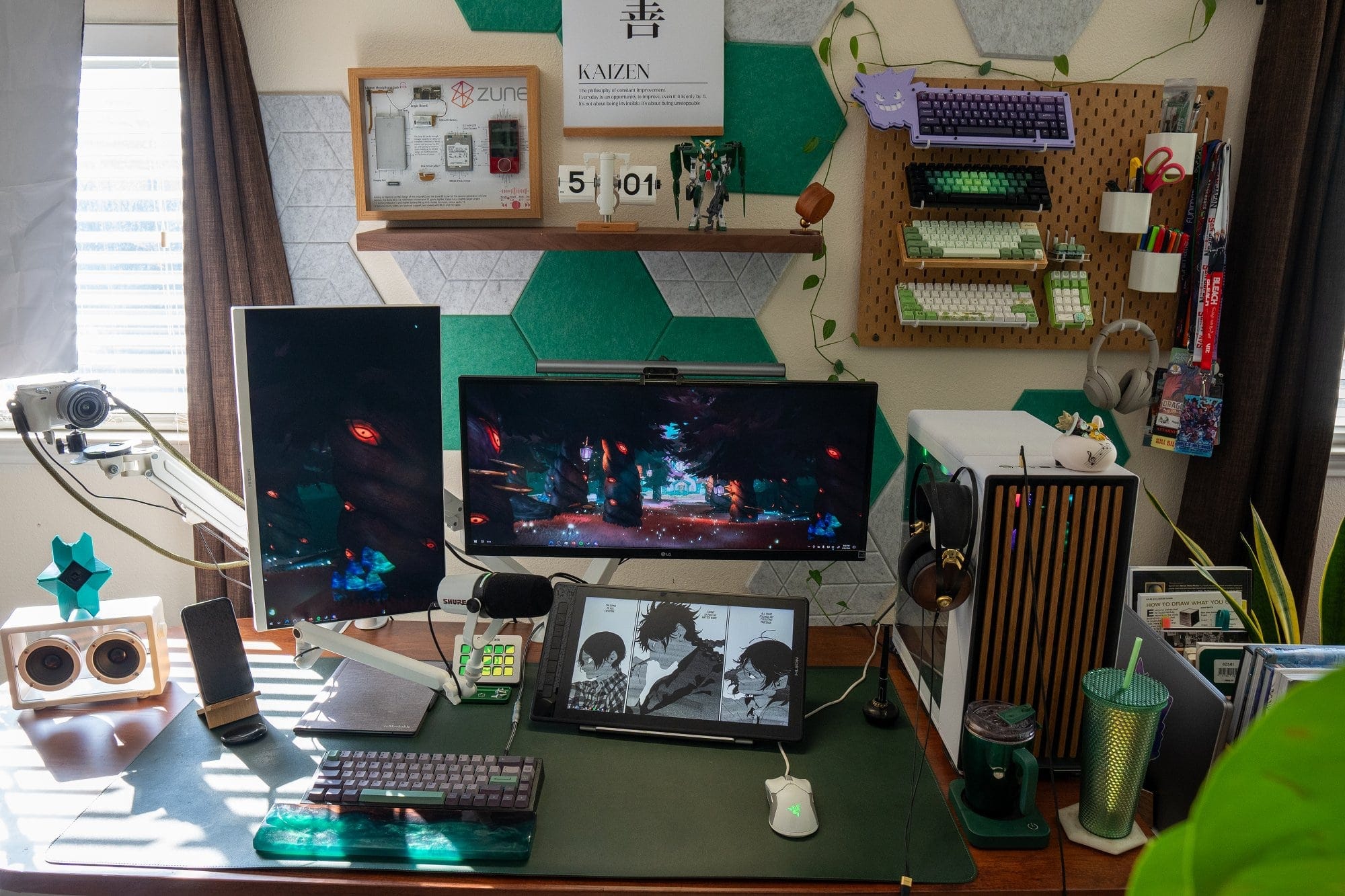 A desk setup with a vertical Samsung Business SH850 monitor, an LG Ultrawide monitor, a HUION KAMVAS Pro 16 drawing tablet, a mechanical keyboard, and a Razer Viper Ultralight mouse