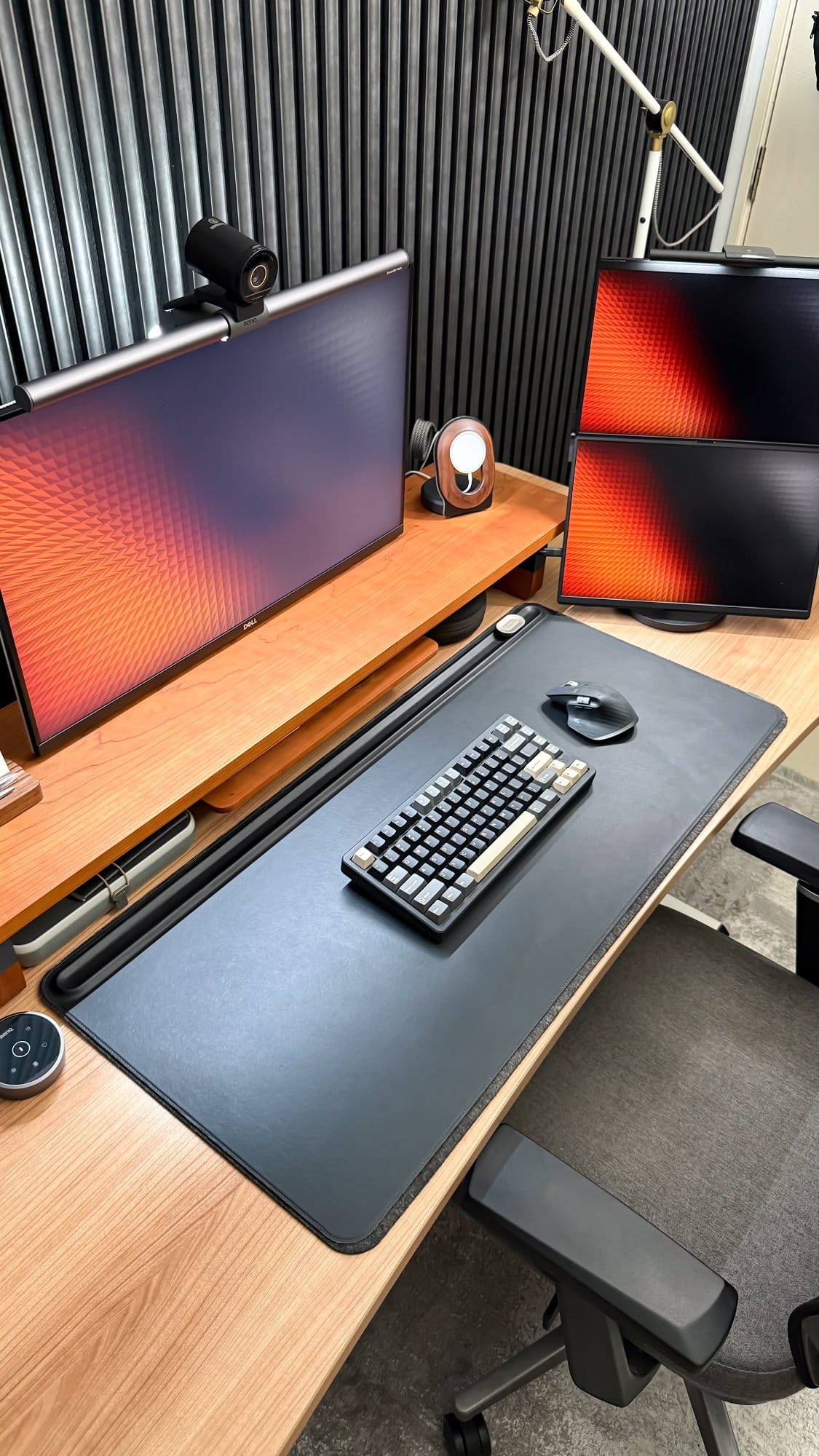 A desk setup with a Dell monitor equipped with a BenQ Screenbar Halo, an Elec Fox Inky 75 keyboard, a Logitech MX Master 3 mouse on an Orbitkey desk mat, and a JSAUX FlipGo dual-screen portable monitor on a Lone Birch desk shelf, all arranged on a Tyyli standing desk with an Emeet OfficeCore M3 speaker and a Reforma acoustic panel backdrop