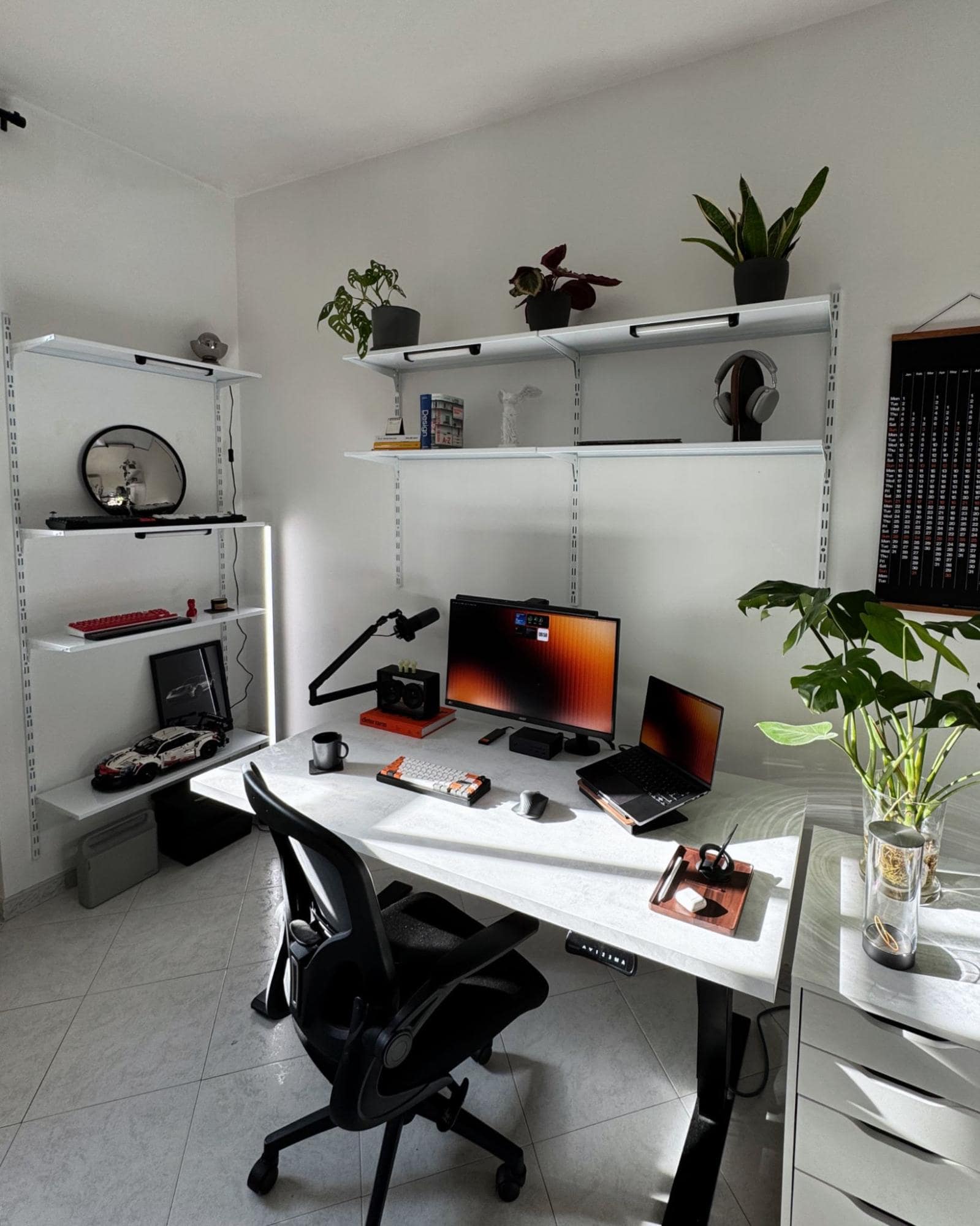 A minimal desk setup with an Acer XV272UP monitor, a MacBook Pro 14″ M3 Pro, and a Keychron K3 Max keyboard