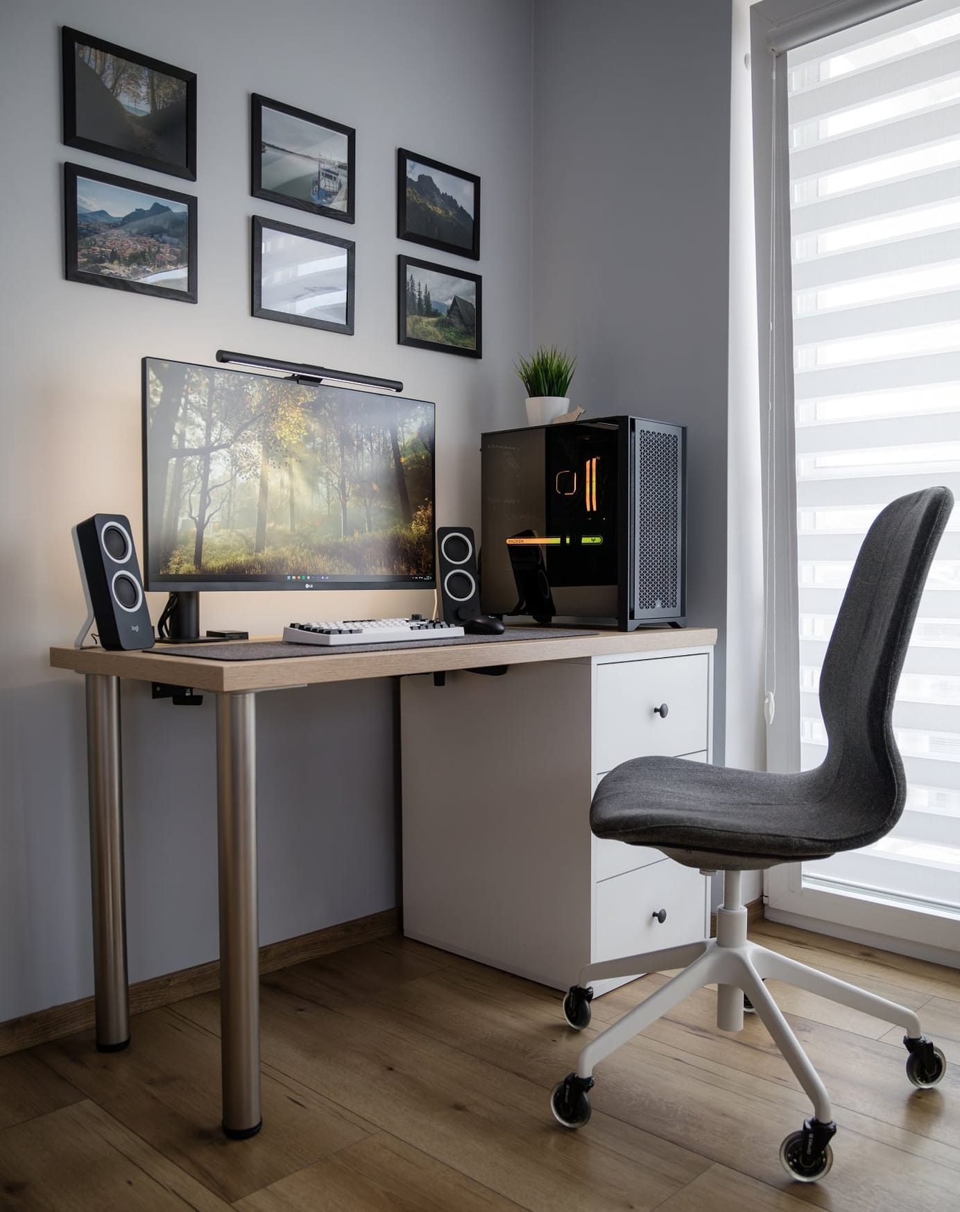 A Modern Home Office Setup with Computer on Desk with a Window